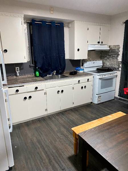 LOW RENT — 5 BEDROOM HOUSE FOR RENT with yard and garage